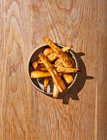 Roast parsnips with black seed honey