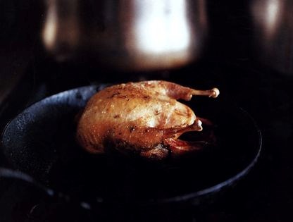 Roast partridge with haricot beans and smoked bacon