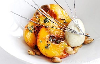 Roast peaches with lemon thyme, vanilla ice cream and toasted almonds