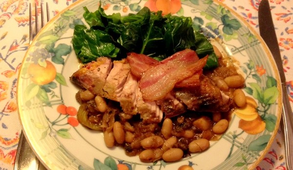 Roast pheasant with bacon, prunes, apples & beans