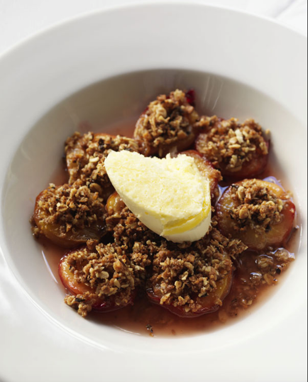 Roast plums with cobnuts and clotted cream