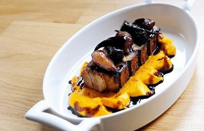 Roast pork belly with anise carrot purée and balsamic glazed carrots