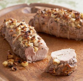 Roast pork tenderloin stuffed with honeyed apples and pecans