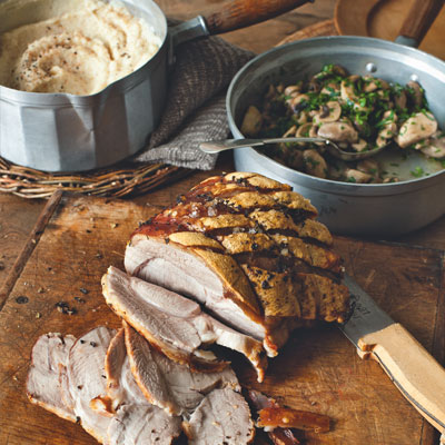 Roast pork with celeriac purée and garlic mushrooms