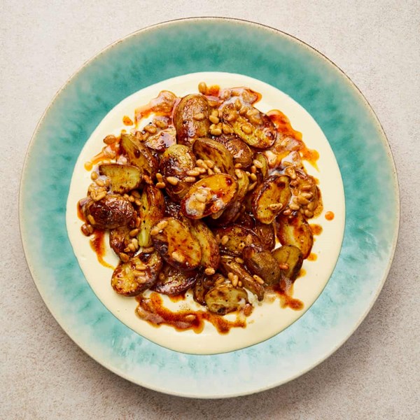 Roast potatoes with aïoli and buttered pine nuts