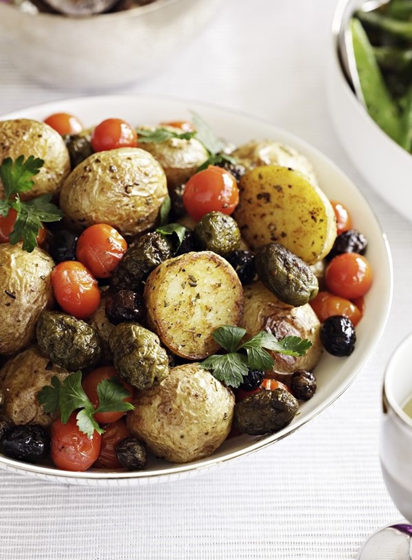Roast potatoes with cherry tomatoes and olives
