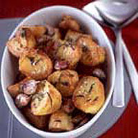 Roast potatoes with goose fat, garlic and rosemary