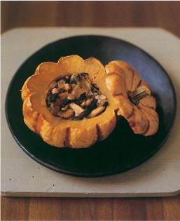 Roast pumpkin stuffed with wild mushrooms and hazelnuts