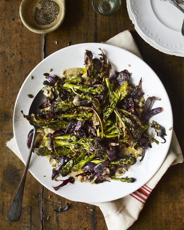 Roast purple sprouting broccoli, smashed white beans, rosemary, onions, chilli and toasted seeds