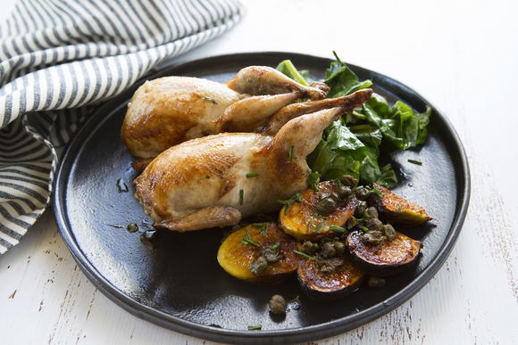 Roast quail stuffed with fig, fennel, lemon zest and tarragon