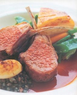 Roast rack of lamb with spring vegetables, hot-pot potatoes, braised lentils, roast shallots and rosemary juice