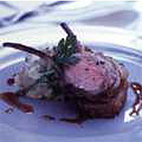 Roast racks of lamb with bean and garlic puree 