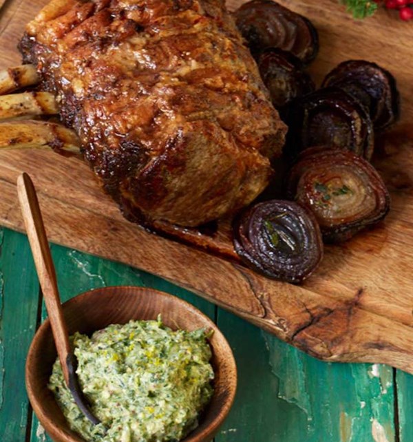 Roast ribs of beef with roasted red onions and watercress and Stilton relish