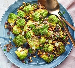 Roast Romanesco with anchovies, capers & currants 