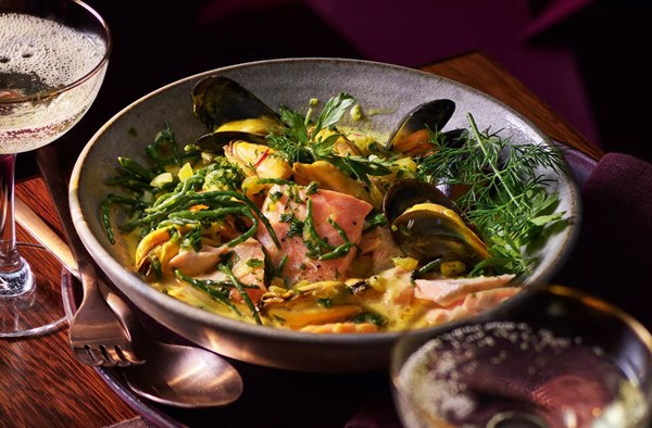 Roast salmon with mussels, samphire & Champagne saffron broth