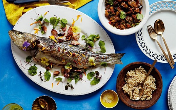 Roast sea bass with spiced aubergine, lemon and honey relish