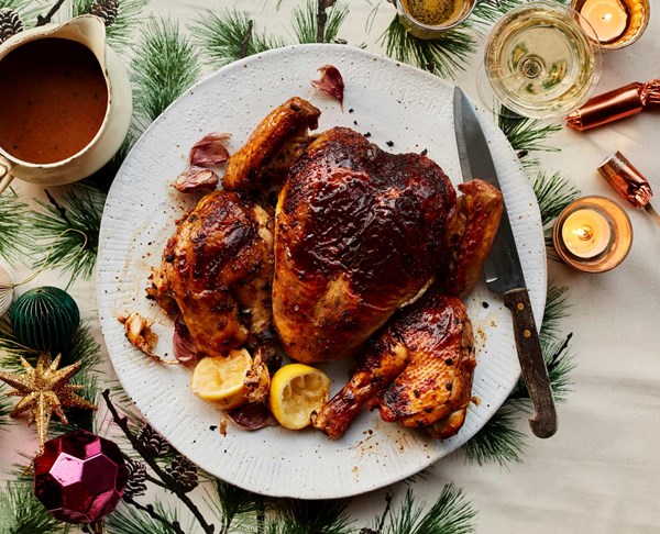Roast spatchcock chicken with chilli and curry leaf butter