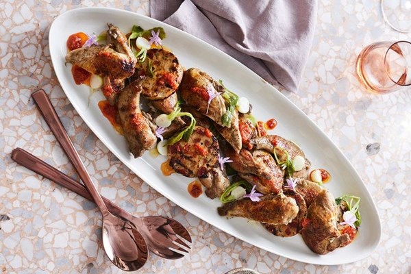 Roast spatchcock with sujuk stuffing and harissa oil [Roy Ner]