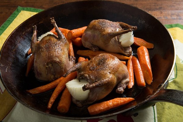 Roast squab with porcini apricot sauce and roasted carrots