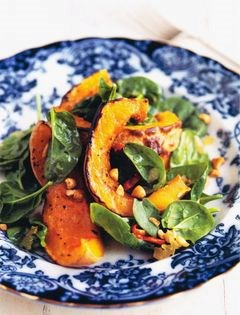 Roast squash, chilli and spinach salad with peanut and ginger dressing