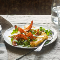 Roast squash wedges on crisp polenta