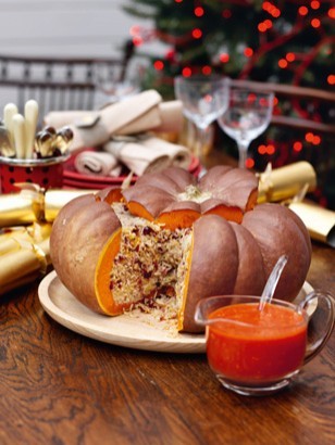Roast stuffed pumpkin with gingery tomato sauce