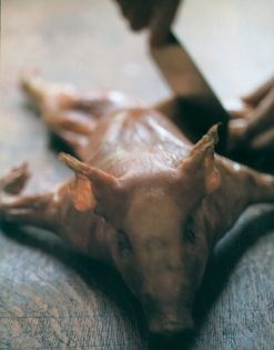 Roast suckling pig with quince sauce