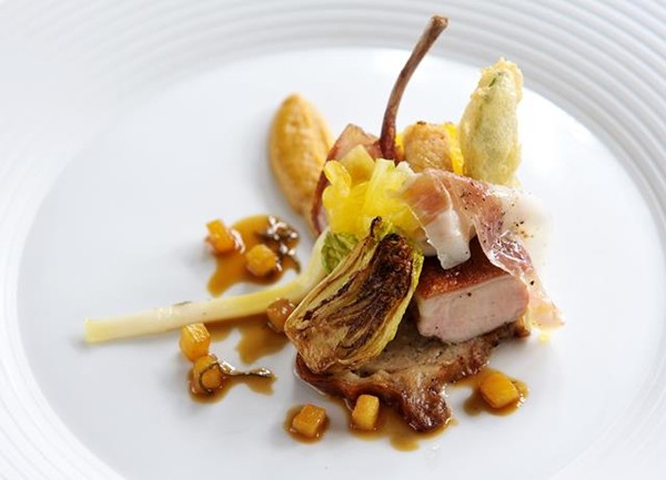 Roast suckling pig with roast pineapple and baby squid