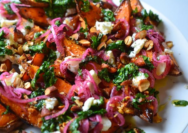 Roast sweet potatoes with pickled onions, coriander and goat's cheese