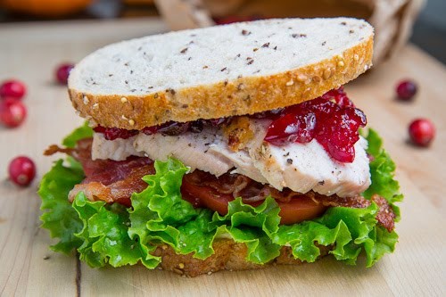 Roast turkey club sandwich with cranberry sauce