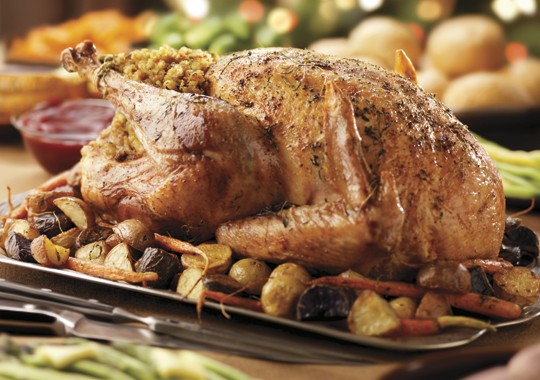 Roast turkey with apricot, bacon and pistachio stuffing