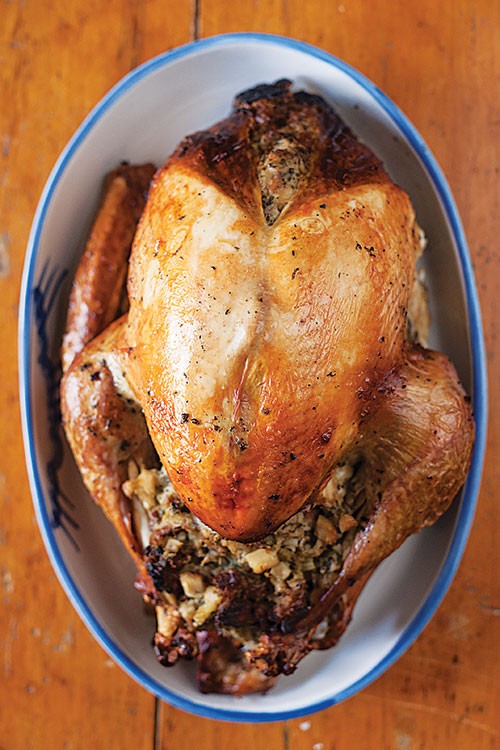 Roast turkey with celery-root stuffing and giblet gravy