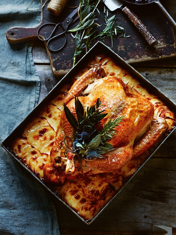 Roast turkey with pear and potato gratin