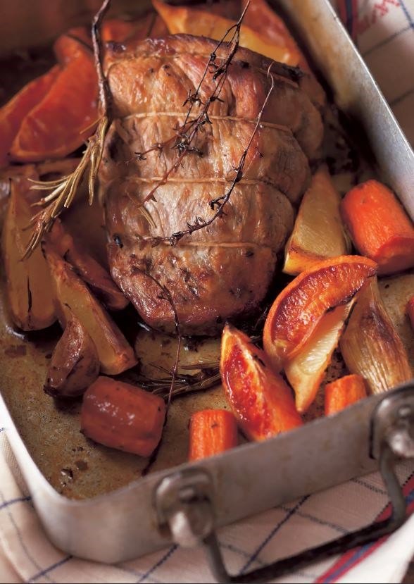Roast veal with oranges and lemons