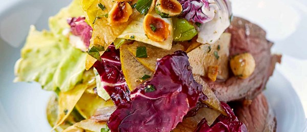 Roast venison and pear salad with toasted hazelnuts