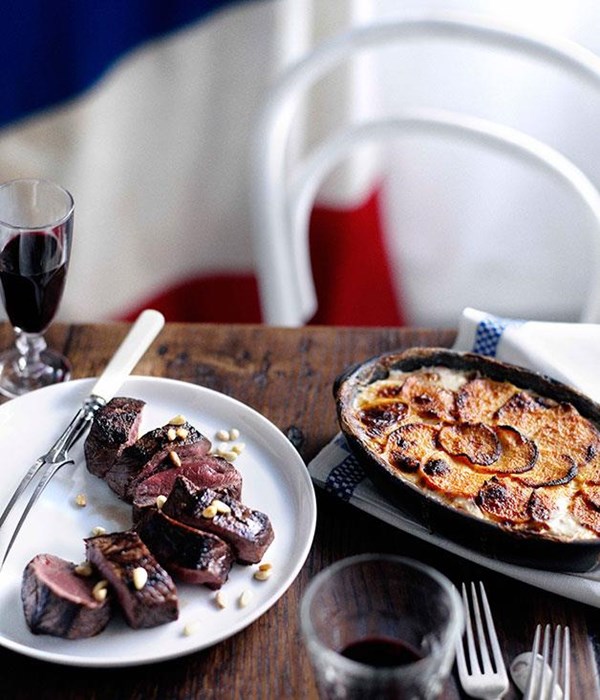 Roast venison with swede and potato gratin infused with pine nuts