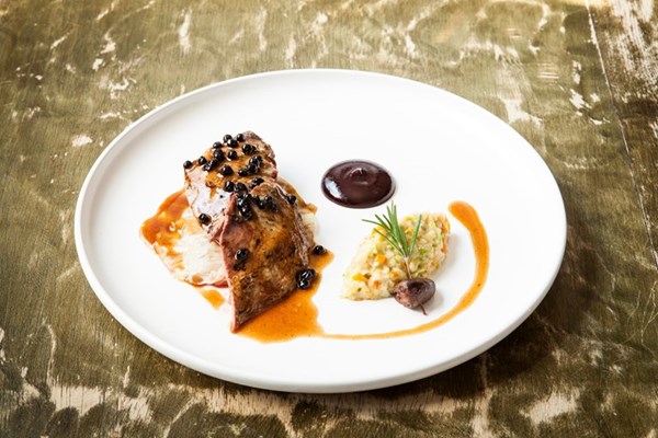  Roast Yorkshire grouse with creamed root vegetables, stuffed cabbage and elderberries