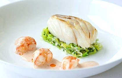 Roasted Alaska halibut with buttered leeks and langoustine bisque sauce