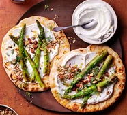 Roasted asparagus & labneh flatbreads with salted almond dukkah