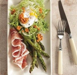 Roasted asparagus and frisée with poached eggs and Romesco sauce