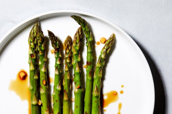 Roasted asparagus with garlic dressing.