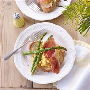 Roasted asparagus with scrambled egg and Parma ham
