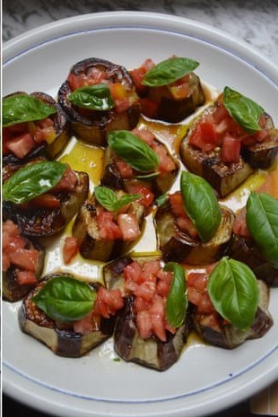 Roasted aubergine with tomatoes and basil