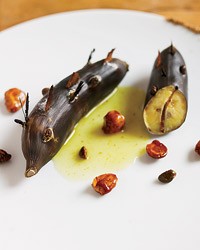 Roasted bananas with spiced syrup and candied nuts