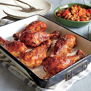 Roasted BBQ drumsticks with cowboy beans