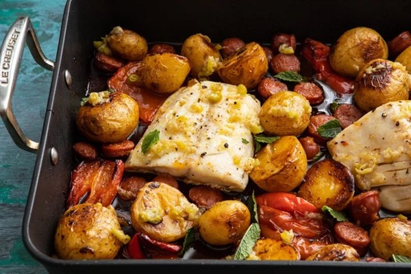 Roasted black cod with chorizo, potatoes, peppers and a pickled chili dressing