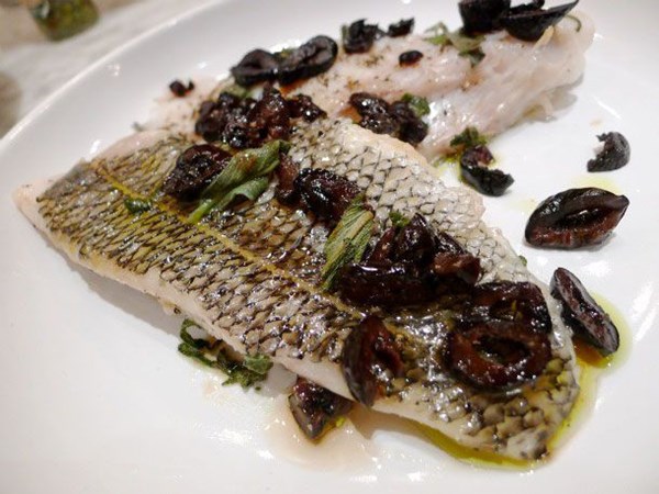 Roasted blackfish with olives and sage