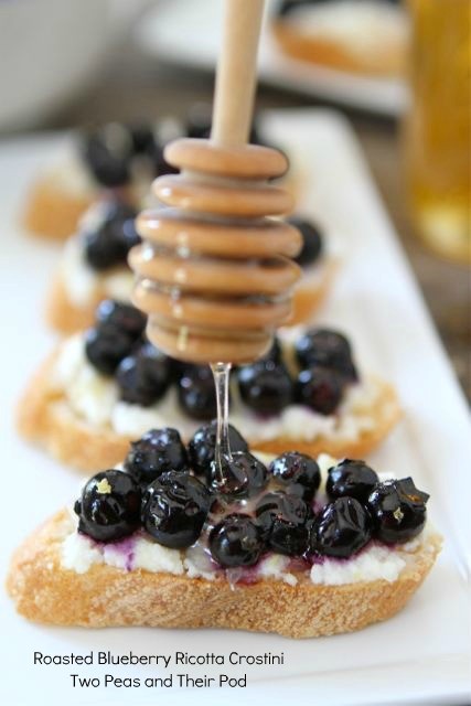 Roasted blueberry ricotta crostini