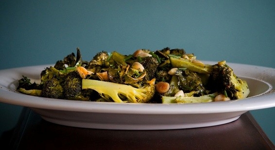 Roasted broccoli with almonds, roasted garlic, and mustard vinaigrette