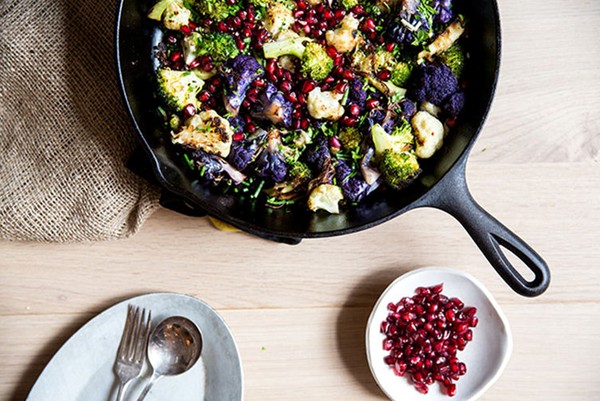 Roasted broccoli with cauliflower, pomegranates & tahini